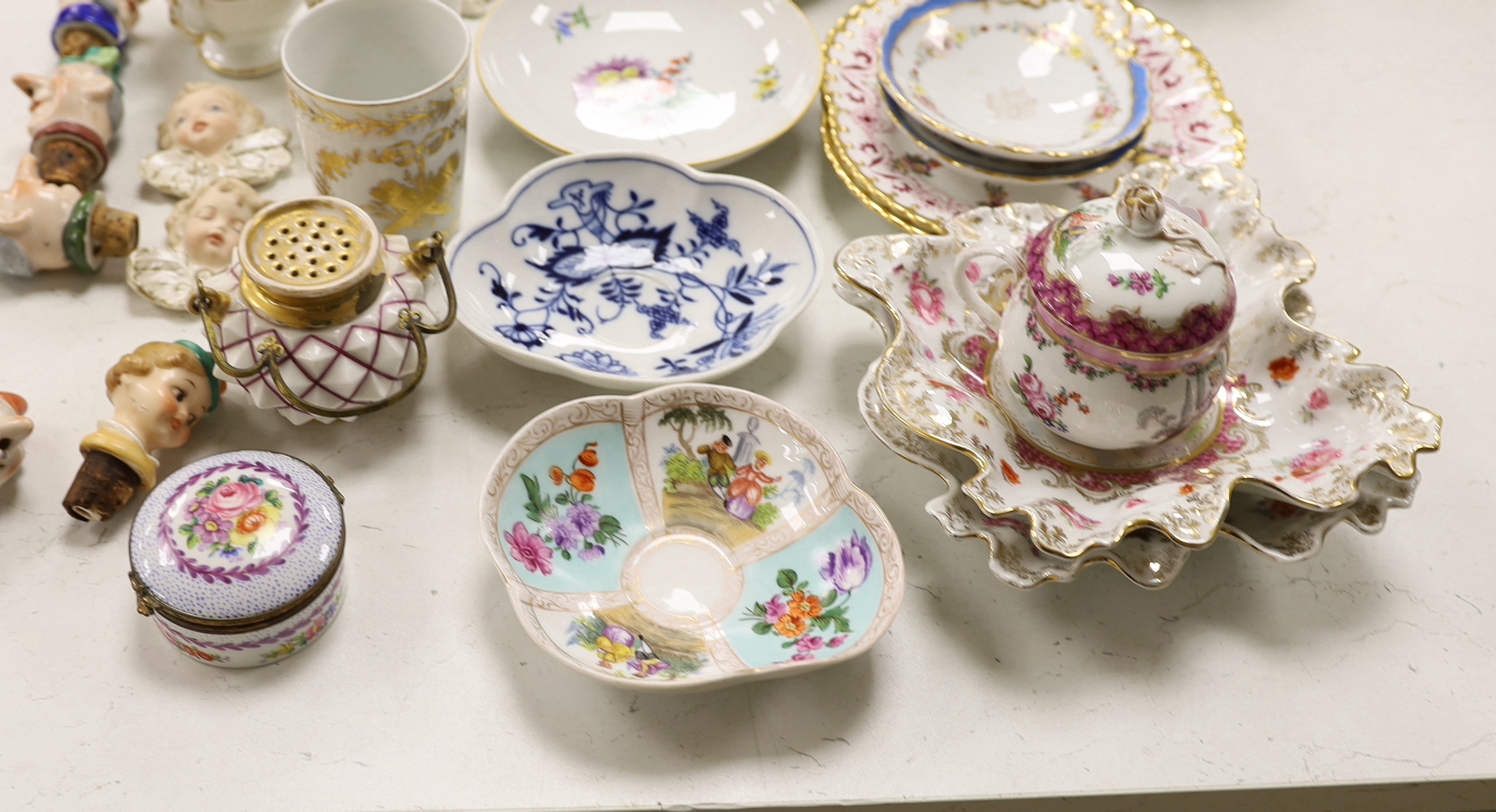 A large group of mainly continental table wares and figurines